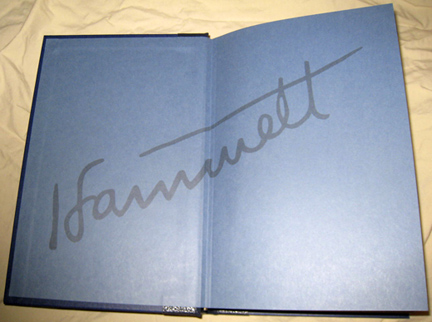 Endpapers with printed facsimile of Hammett's signature